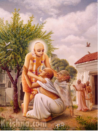 Devotional painting (Bhaktivedanta Book Trust) of Chaitanya Mahaprabhu bending down to lift and embrace a kneeling, disfigured brahmana outside a temple courtyard, with onlooking devotees nearby - the moment Mahaprabhu returns to embrace Ba