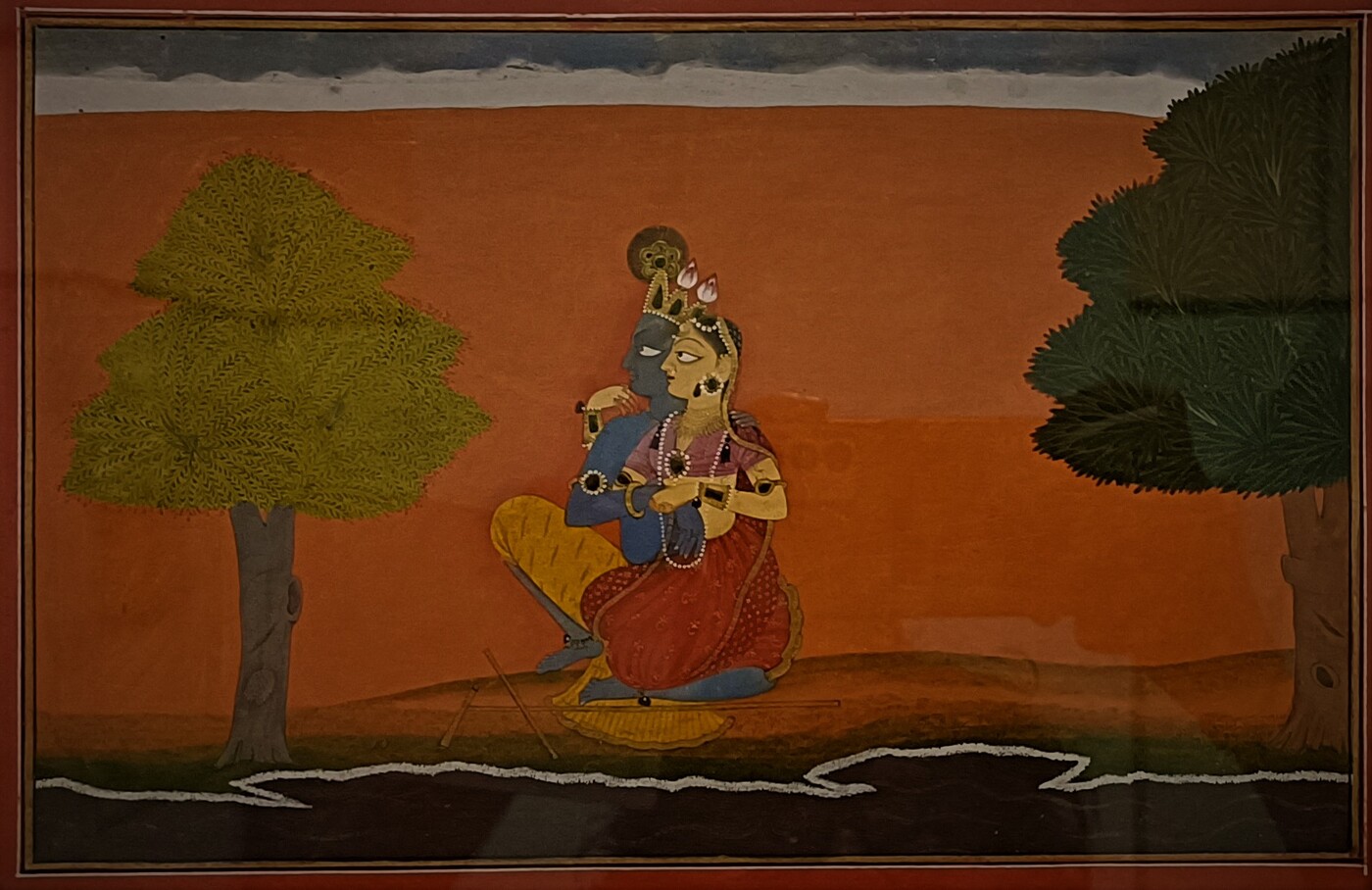 A Pahari miniature painting (circa 1730, by the artist Manaku) of Radha and Krishna seated on the banks of the Yamuna in Vrindavana - the very setting Devakinandana Dasa Thakur names first in the opening line of Vaishnava-vandana, 'vrndavan