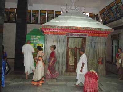 Pilgrims visiting Haridasa Thakura's samadhi shrine by the sea at Puri today, near the Jagannatha temple.