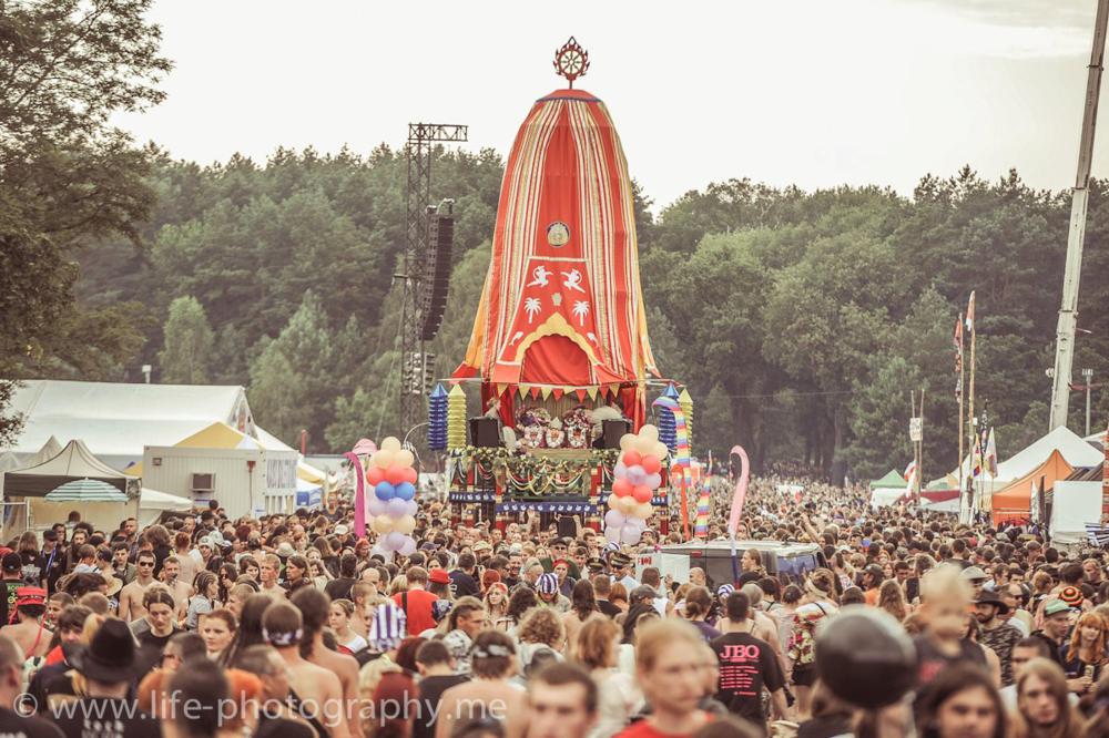 Photograph of a modern Ratha Yatra festival chariot and crowd in Europe, illustrating the living, worldwide continuation of the sankirtana movement Jagadananda Pandita served.