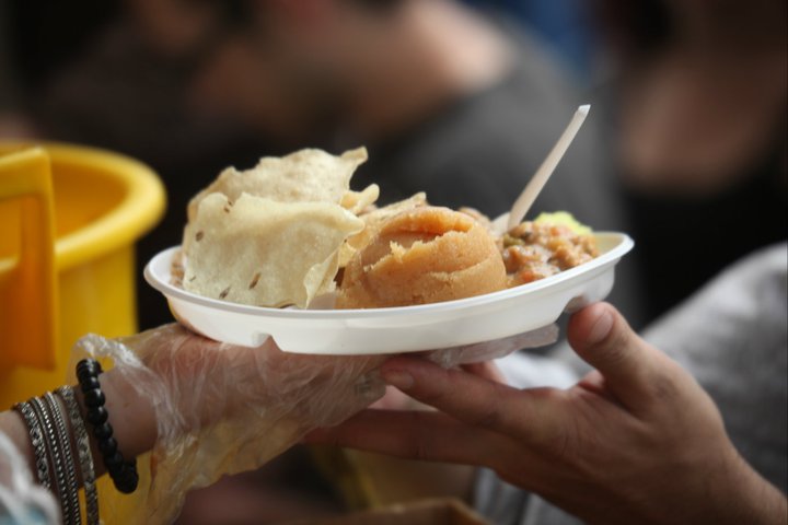 Photograph of a plate of prasadam food being served, representing Jagadananda Pandita's celebrated service of cooking for and feeding Sri Chaitanya Mahaprabhu and the devotees.