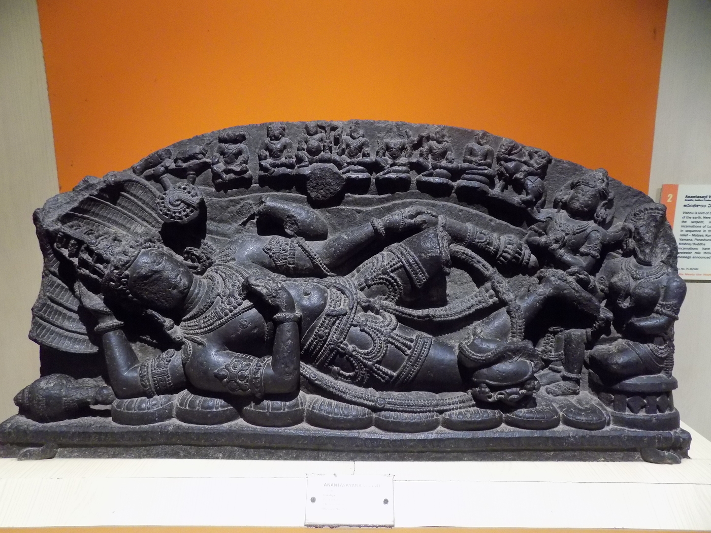 A sculpture of Vishnu reposing on the serpent Ananta in the Causal Ocean — the form of Karanodakashayi Vishnu (Maha-Vishnu) described in Brahma-samhita 5.47 as a portion of a portion of Govinda.