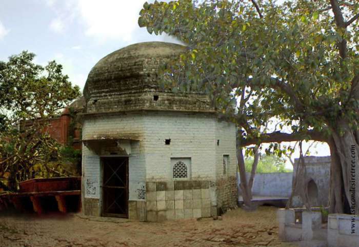 The domed samadhi (memorial tomb) of Madhu Pandit Goswami, within the Radha-Gopinatha temple compound in Vrindavana.