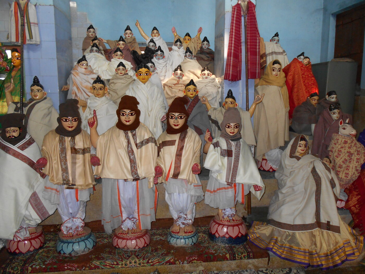 The Panca-tattva together with thirty-seven wooden deities of Mahaprabhu's associates, preserved at Sribas Angan in Nabadwip.