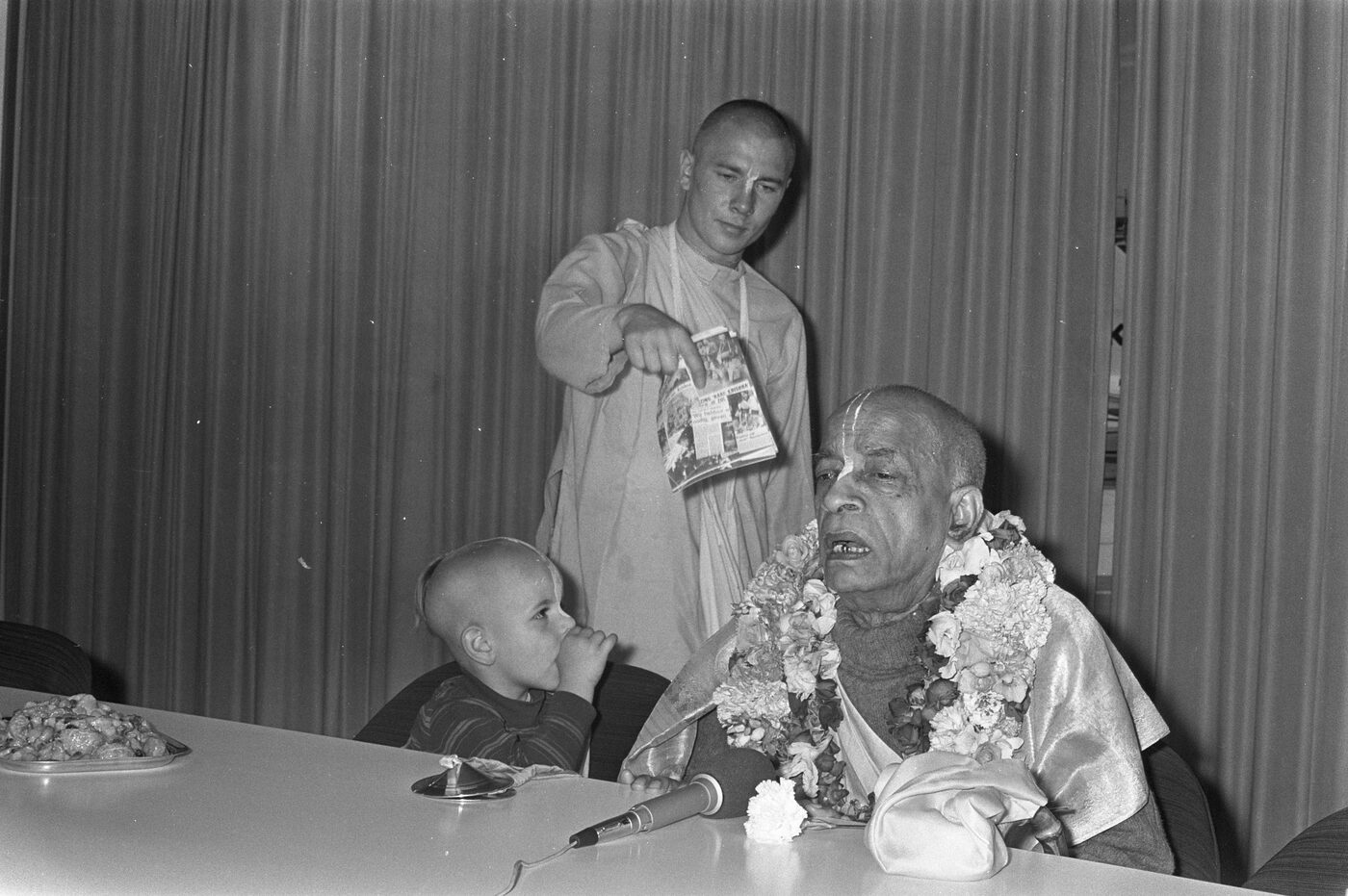 Srila Prabhupada at a press conference at Schiphol Airport, Netherlands, 28 July 1972, during his travels establishing the movement in Europe.