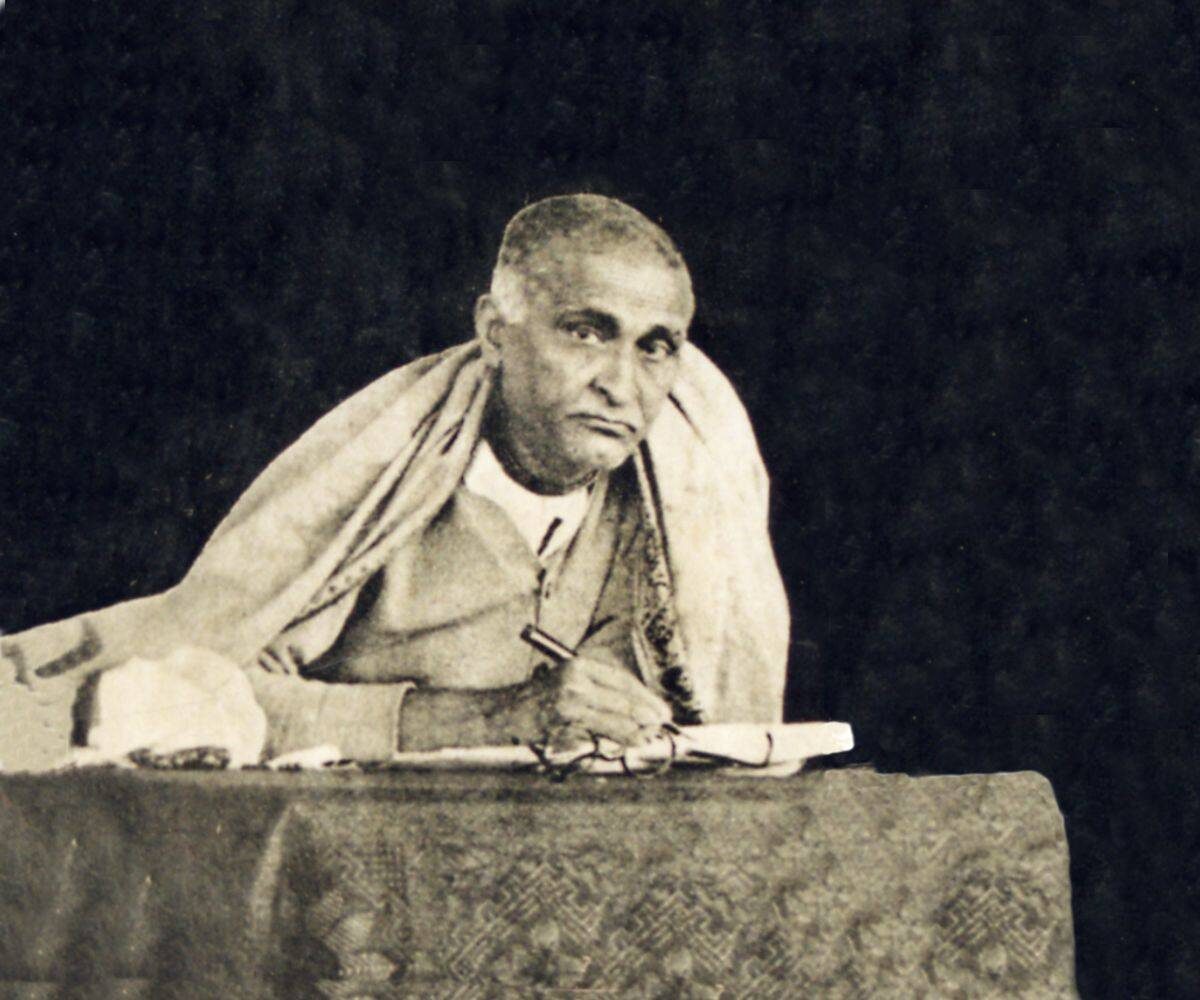 Srila Bhaktisiddhanta Sarasvati Thakura at his writing desk - the guru whose instruction (given at their first meeting in 1922, and by letter in the 1930s) set Srila Prabhupada on the path of preaching Krishna consciousness in English.