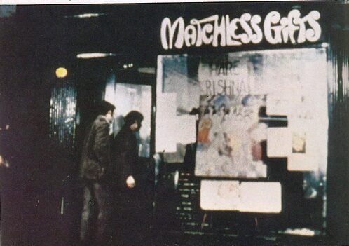 The storefront of 'Matchless Gifts' at 26 Second Avenue, New York City, which Srila Prabhupada rented in 1966 as his first American storefront temple; a 'Hare Krishna' sign is visible in the window.