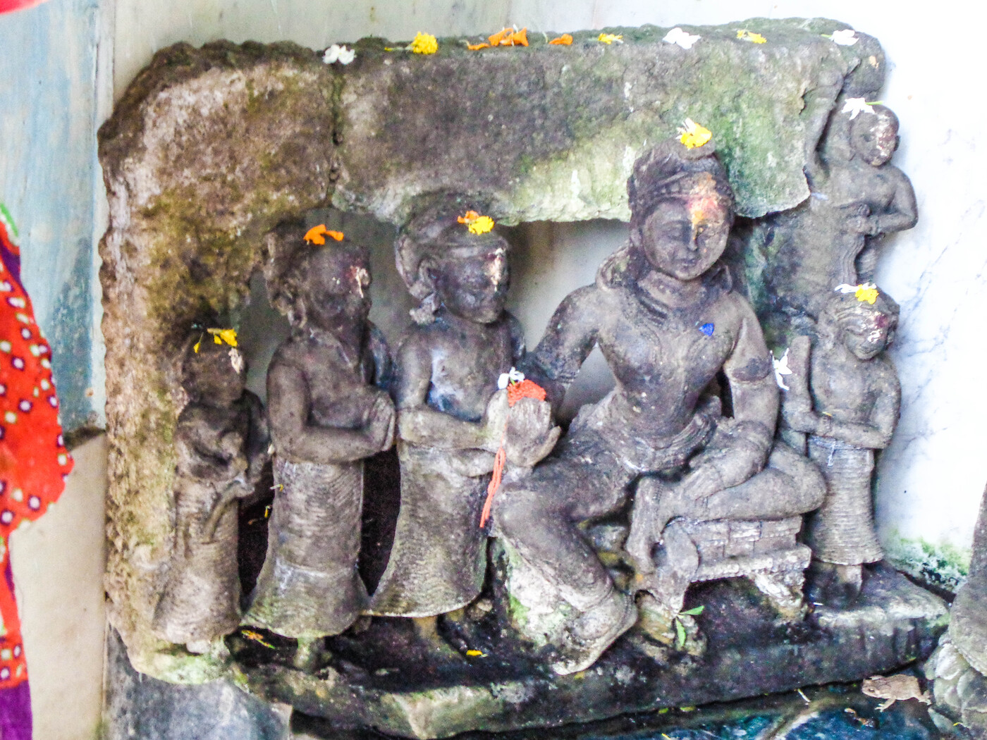 A detached stone sculpture, a possible depiction of Gajapati Prataparudra with queen and attendants, from the Paramahansanath Temple of Biribati, Cuttack.