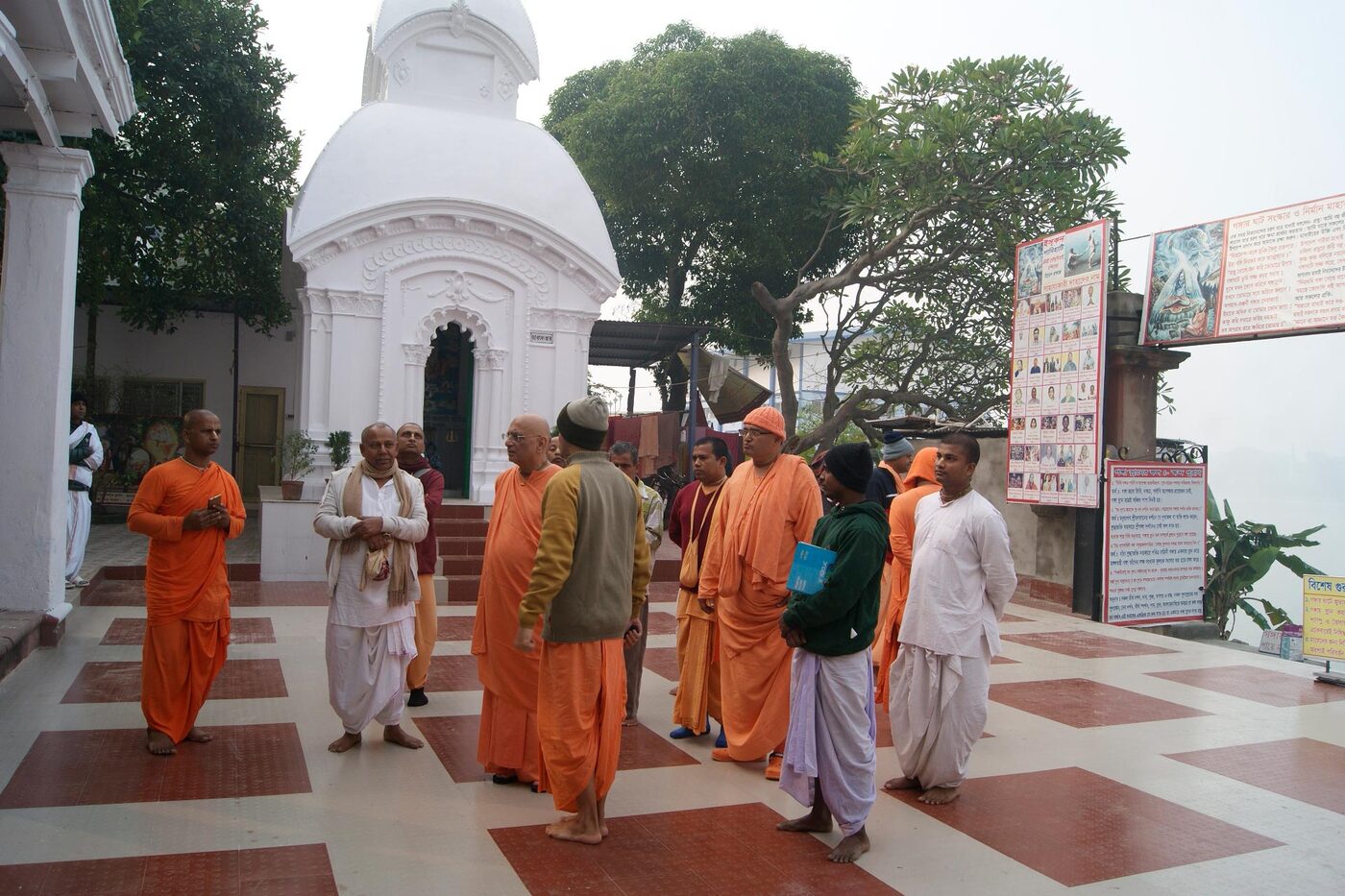 A riverside shrine and visiting Vaishnava sannyasis at present-day Panihati, Raghava Pandit's home village and a living Gaudiya Vaishnava pilgrimage site.
