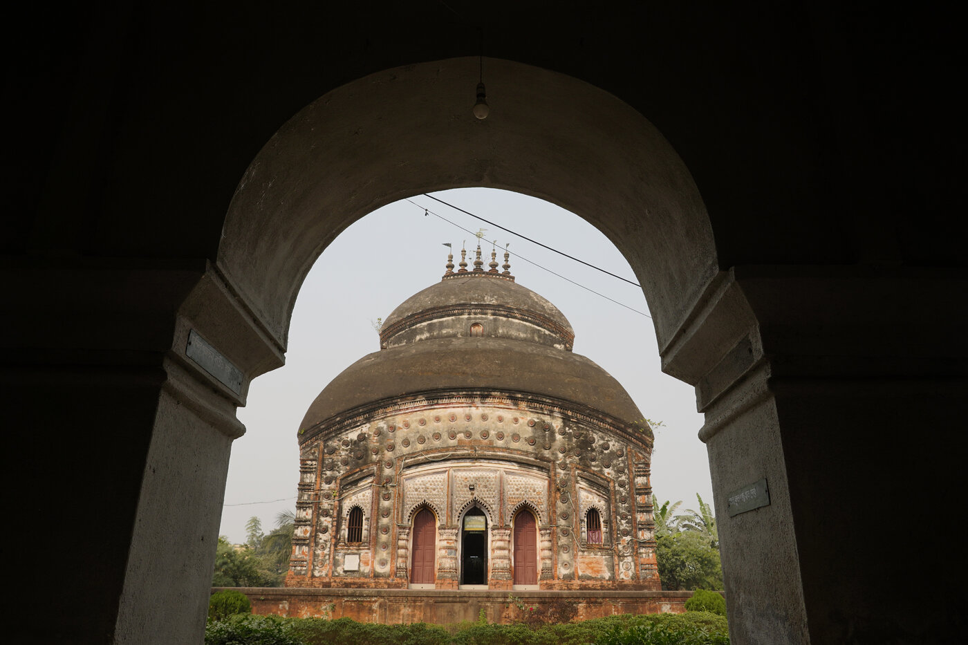 The Sri Krishna Raya Jiu temple in the Rathtala area of Kanchrapara, West Bengal -- the atchala-style Radha-Krishna temple the commentary tradition credits Shrinatha Pandita with founding.