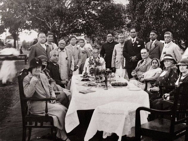 Bhaktisiddhanta Sarasvati at dinner with British dignitaries, before 1937