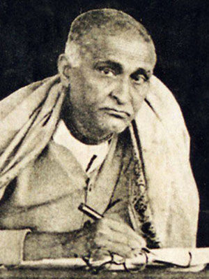 Bhaktisiddhanta Sarasvati editing an article, 1930s